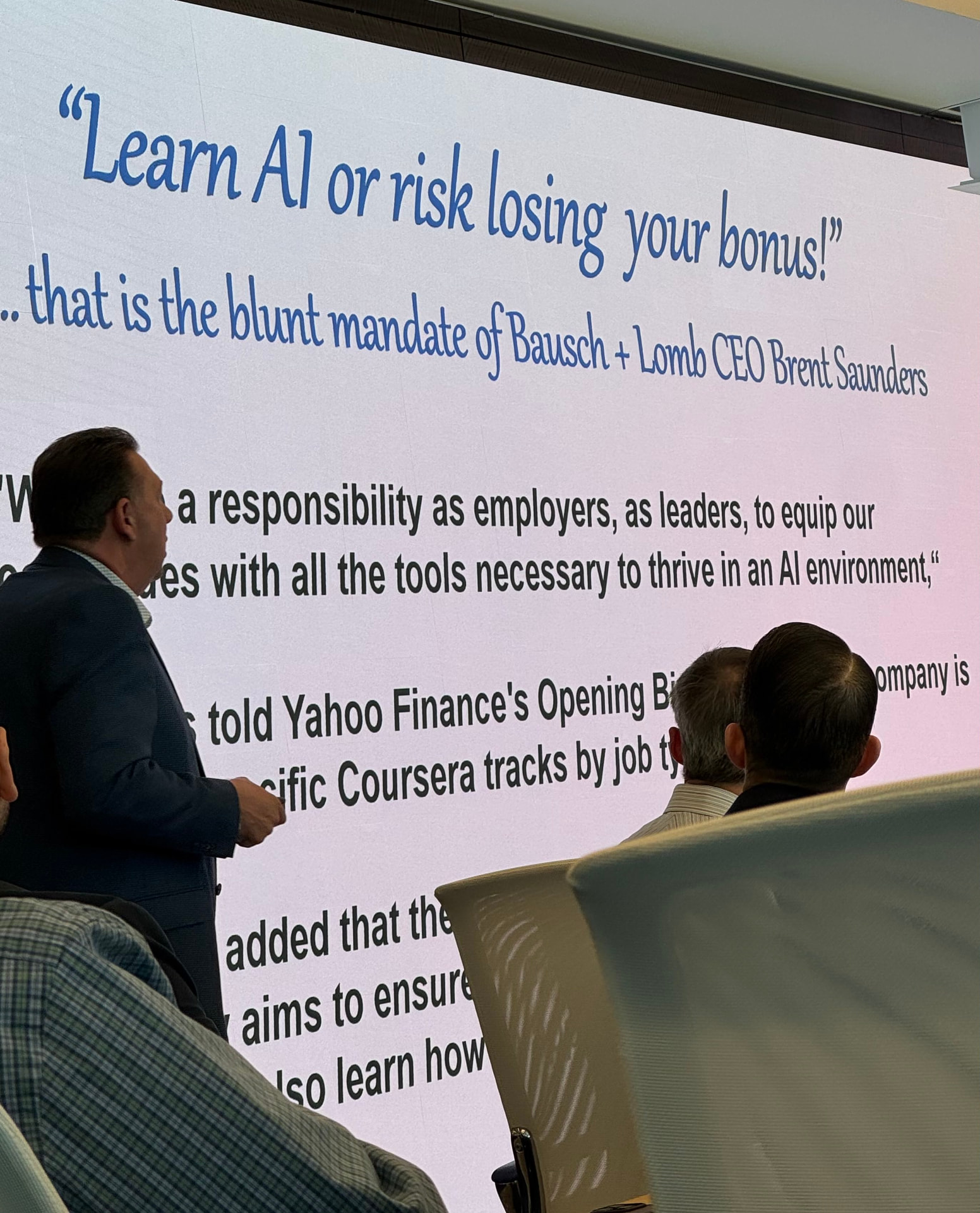 A speaker presenting on AI expectations for employers
